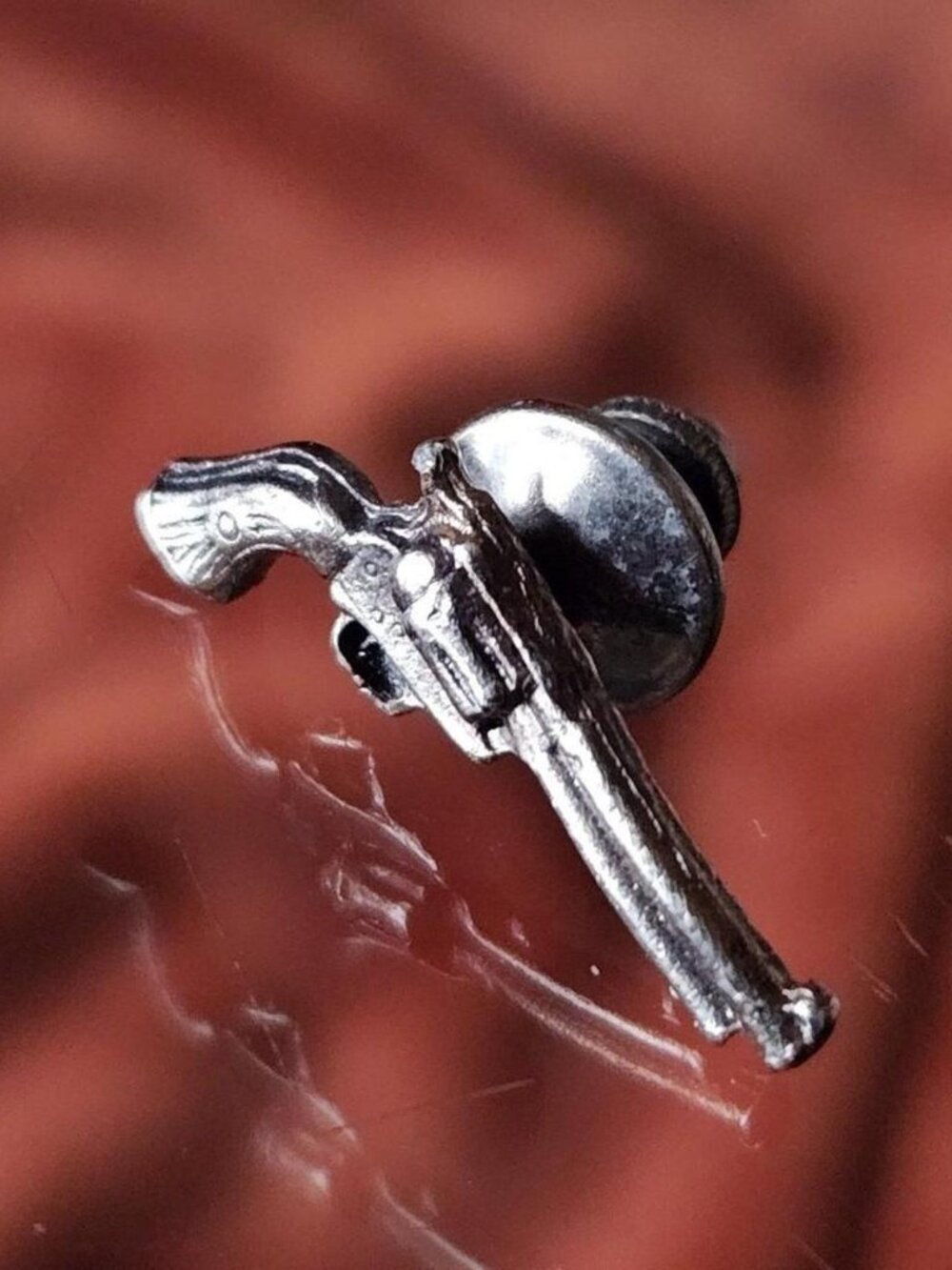Vintage gunmetal Gun/Revolver lapel pin.